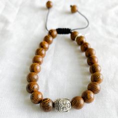 Wood Buddha Unisex Bracelet Casual Everyday Bracelet, Adjustable Holistic Brown Jewelry, Casual Wooden Beads Jewelry As Gift, Casual Wooden Beaded Jewelry Gift, Symbolic Adjustable Rectangular Jewelry, Rectangular Casual Jewelry For Everyday, Casual Rectangular Jewelry For Everyday, Casual Rectangular Everyday Jewelry, Nickel-free Brown Bracelets As Gift