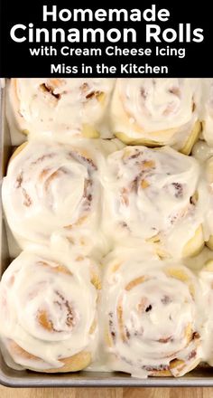 homemade cinnamon rolls with cream cheese icing in a baking pan