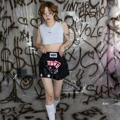 "Vintage Y2K cool shiny kickboxing shorts in black & white take their inspiration from vintage designs. These iconic angry eye embroidery shorts will be the perfect finish to any outfit. DESCRIPTIONS: Tag: Rondat, length: 37 cm / 14.4\", waist: 31 cm / 12\" (extra stretchy, tie waist). Material: polyester. Size tag on item: -. Approximate modern size: XS-L. Our model Liana is 5.4 ft (167 cm), she is usually dressed in size XS. If you want to know more, please, contact us! Don't Forget To Follow Us On INSTAGRAM : volga.vintage SKU: SK0231" Y2k Style Streetwear Shorts, Trendy Athletic Shorts For Streetwear, Punk Streetwear Shorts, Punk Style Streetwear Shorts, Edgy Black Shorts For Streetwear, Black Cheerleading Shorts, Casual Black Shorts For Cheerleading, Trendy Streetwear Athletic Shorts, 90s Black Summer Shorts