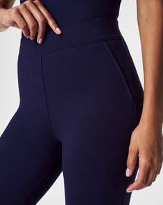 This smoothing pant comes in our premium ponte fabric with targeted compression built in, powered by SPANX CoreSure Tech™. With comfortable 4-way stretch, these curve-hugging kick flares provide the PerfectFit, every time. All you have to do is simply pull them on. No zippers, no buttons, and no pockets (so no bulk!) at the hips—all for the ultimate smoothing effect. | Spanx Women's SPANXsmooth PerfectFit Ponte Kick Flare Pant Sleek Sports Bottoms In Elastane, Smoothing Elastane Athleisure Bottoms, Compressive Elastane Leggings For Work, Activewear With Wide Waistband And 5-inch Inseam, Fitted Elastane Activewear With Wide Waistband, 4-way Stretch Activewear With Wide Waistband, Micro-elastic Elastane Pants With Contoured Waistband, Functional Mid-rise Elastane Pants, Fitted Elastane Pants For Pilates