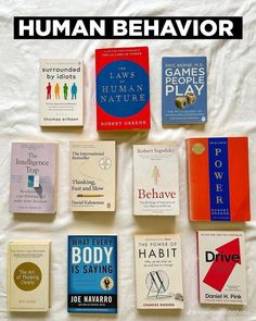 there are many different books on the bed with text overlay that says human behavior