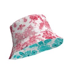 This Cerise and Teal Floral Reversible bucket hat can be worn on both sides, making it easy to match with different outfits. Made of breathable premium fabric, this hat will become your go-to streetwear accessory. * 100% polyester * Fabric weight: 8.1 oz/yd² (275 g/m²)  * Moisture-wicking and breathable fabric * Linen feel material * Reversible * Available in 2 sizes * Blank product components sourced from China Summer Pink Reversible Bucket Hat, Casual Reversible Pink Bucket Hat, Pink Reversible Bucket Hat With Curved Brim, Casual Multicolor Reversible Bucket Hat, Multicolor Reversible Bucket Hat For Summer, Reversible Multicolor Bucket Hat For Summer, Summer Multicolor Reversible Bucket Hat, Summer Reversible Bucket Sun Hat, Casual Reversible Bucket Hat