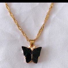 New Black And Gold Necklace Never Worn Super Cute And Trendy Adorable Necklace Casual Black Necklace For Party, Casual Black Necklace For Gift, Black Butterfly Necklace For Gift, Black And Gold Butterfly, Black And Gold Necklace, Brandy Melville Jewelry, Gold Butterfly Necklace, Butterfly Necklace Gold, Jewelry Black