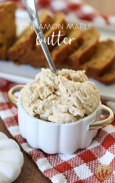 cinnamon maple butter in a white bowl on a red and white checkered tablecloth