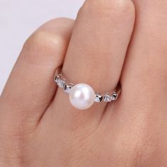 With a luminous freshwater cultured pearl and lab-created white sapphire accents, this Stella Grace ring has a scalloped band for an accessory you'll love. With a luminous freshwater cultured pearl and lab-created white sapphire accents, this Stella Grace ring has a scalloped band for an accessory you'll love.Click on this JEWELRY & WATCHES GUIDE to learn about fit, styles, materials and more! Nickel free Metal: sterling silver Packaging: boxed Plating: rhodium Width: 7.5 mm Finish: polishedSTON White Pearl Jewelry With Prong Setting, Pearl Jewelry With Prong Setting, Anniversary Pearl Ring, Silver Packaging, White Sapphire Ring, White Sapphire, Cultured Pearls, Sapphire Ring, Fresh Water