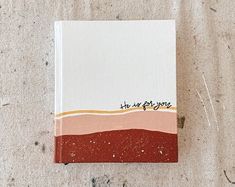 a small notebook with the words, we are going written on it