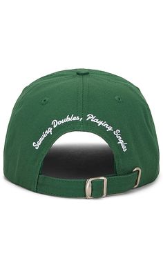 Find Los Sundays The Tequila & Tennis Country Club Dad Cap on Editorialist. Los Sundays The Tequila & Tennis Country Club Dad Cap in Green. Los Sundays The Tequila & Tennis Country Club Dad Cap in Green. 100% cotton. Made in China. Front embroidered logo detail. Ventilating eyelets at top. Adjustable back strap. Brim measures approx 2.75 in length OS measures approx 24-26 in circumference. LSUN-MA3. LSCGW0010. Green Visor Hat With Letter Print, Green Curved Bill Hat With Letter Print, Green Hat With Letter Print And Curved Bill, Adjustable Green Dad Hat With Letter Print, Green Adjustable Dad Hat With Letter Print, Green Dad Hat With Letter Print And Adjustable Fit, Adjustable Green Hat For Baseball Season, Green Curved Brim Dad Hat For Baseball Season, Green Curved Bill Hat For Baseball Season