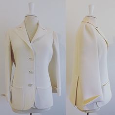 "Sophisticated white soft & lightweight wool blazer. Has some discoloration as shown in photo. I have not tried to remove so am not sure if its permanent. Measurements taken flat: 16.5\" shoulder seam to seam 22: sleeve 19\" chest 27\" length" Elegant Cream Long Sleeve Sport Coat, Tailored Elegant Cream Sport Coat, White Fitted Sport Coat For Business Casual, Fitted White Sport Coat For Business Casual, Cream Long Sleeve Blazer For Formal Occasions, Cream Long Sleeve Formal Blazer, Cream Fitted Blazer For Work, Tailored Cream Sport Coat, White Vintage Outerwear For Formal Occasions