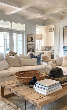 a living room filled with furniture and lots of windows