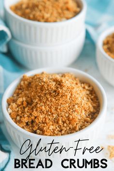 three white bowls filled with bread crumbs on top of a blue and white cloth