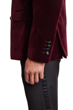 Whether you are attending a special event or a formal event, this maroon velvet double-breasted tuxedo jacket will be the perfect choice, featuring a peak lapel with side vents and a complementary pocket square. A poly-nylon blend makes this jacket comfortable and stylish. Wear it with Sloane tux pants and a bow tie to complete the look.PRODUCT DETAILS: style 6472J slim fit suit jacket double-breasted peak lapel complimentary pocket square side vents poly-nylon blend dry clean only imported Fall Double Breasted Tuxedo Suit, Fall Semi-formal Tuxedo With Double Button Closure, Fall Semi-formal Tuxedo With Double Button, Formal Velvet Blazer With Double Button, Elegant Burgundy Blazer For Party, Elegant Burgundy Party Blazer, Formal Burgundy Blazer, Burgundy Formal Blazer, Luxury Velvet Blazer For Winter