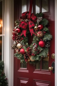 a christmas wreath hanging on the front door