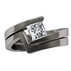 an engagement ring with a princess cut diamond in the center and two matching bands on each side