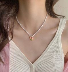 Introducing our stunning pink tulip pendant pearl beaded necklace choker, the perfect statement piece to elevate any outfit! Handcrafted unique design features a delicate pink tulip pendant, complemented by lustrous faux pearl beads for a touch of elegance and sophistication. This beautiful necklace is the perfect accessory for any occasion, whether it's a romantic dinner date, a night out with friends, or a special event. The floral design is perfect for spring and summer, adding a touch of feminine charm to your wardrobe. Don't miss out on this must-have accessory for the season! Order now and enjoy the compliments that come with wearing this gorgeous piece. With our limited time sale, there's no better time to treat yourself or someone special to this stunning necklace. 💎 Features: ♥ H Pink Heart-shaped Pearl Necklace, Heart-shaped Pink Pearl Necklace, Pink Pearl Necklace For Valentine's Day, Valentine's Day Pink Beaded Necklaces, Valentine's Day Pink Pearl Necklace, Pink Pearl Necklace With Heart Beads, Valentine's Day Pink Pearl Charm Necklace, Tulip Necklace, Floral Statement Necklace