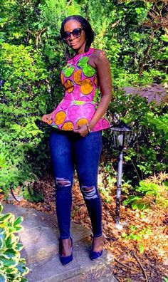 A simple and chic African print peplum top in a modern pattern.  The colours are in a fuschia pink, mint green and orange with dashes of deep blue and white. The back is in a skater back style and closure is with a back zip. Partially lined. 100% cotton Hand made in Ghana. As the top is snug in the body please check the measurements in the chart before placing your order. Any questions, feel free to send a convo.  Care Wash with like colours on a cool gentle cycle. Iron on medium heat. dry away from sunlight. African Peplum Top, Mint Green And Orange, African Print Peplum Top, Printed Peplum Top, Fuschia Pink, Modern Pattern, African Dress, African Print, Green And Orange