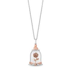 Meaningful encouragement and endless hope radiate from this Belle enchanted rose diamond and white topaz pendant. Featuring a 10K rose gold enchanted rose behind a domed façade of white topaz, 16 round brilliant cut diamonds accent the sterling silver vessel with glimmering delight. The intact pink petals symbolize that all remains possible when you open your heart to true love and its many gifts.Our Enchanted Disney fine jewelry collection is charming, romantic and full of whimsy. Helzberg and Enchanted Disney, Enchanted Disney Fine Jewelry, Rose Diamond, Disney Belle, Disney Charms, Enchanted Rose, Helzberg Diamonds, Topaz Pendant, Rose Pendant