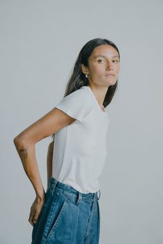 The Classic T-Shirt, perfected. With a slightly looser fit than our Lou Tee, it's also a longer length that can be tucked or worn out. Made from 100% silk noil, it’s the perfect-fitting, super-soft staple you always reach for; designed to get better with age and distinguished by the specific, perfectly imperfect nubby texture of raw silk. Summer Relaxed Fit T-shirt For Daywear, Simple Summer Tops For Casual Gatherings, Simple Tops For Casual Summer Gatherings, Classic Everyday Spring Tops, Classic Everyday Summer Tops, Spring T-shirt With Shirttail Hem For Everyday Wear, Simple Top For Casual Gatherings In Spring, Relaxed Tops With Shirttail Hem For Casual Gatherings, Effortless Tops With Shirttail Hem