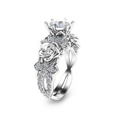 a white gold engagement ring with roses and diamonds