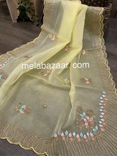 Beautiful light yellow dupatta with gota and embroidery motifs. Semi-stitched Cream Organza Dupatta, Traditional Cream Organza Dupatta, Semi-stitched Yellow Saree With Sheer Dupatta, Cream Organza Dupatta With Chikankari Embroidery, Gold Silk Dupatta With Gota Work, Yellow Silk Embroidered Fabric For Diwali, Gold Tissue Silk Dupatta With Resham Embroidery, Green Organza Dupatta With Cutdana Detail, Green Organza Dupatta With Cutdana