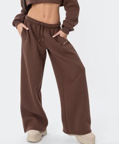 straight leg Baggy Brown Bottoms With Elastic Waistband, Sporty Brown Pants, Brown Full Length Bottoms With Side Pockets, Sporty Brown Sports Pants, Casual Brown Wide Leg Sweatpants, Baggy Brown Pants For Loungewear, Sporty Brown Bottoms With Elastic Waistband, Sporty Stretch Brown Pants, Brown Full Length Sports Pants