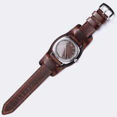 "WW2 Military Pilot Bund Strap - Antique Brown FEATURES -Compatible with all watches between 18mm and 24mm lug width. -Double layered leather construction -Standard Length: 80mm/125mm - 3.1\"/ 4.9\" -Thickness: 1.6-1.8mm -316L Stainless steel buckle included. -Durable waxed thread -Handmade and hand stitched *Measure the buckle and lug width (the width between the area where your watch strap fits) and select the right size. *When that extra piece-bund is removed, the strap becomes classic two-pi Timeless Watch With Bracelet Strap For Everyday, Timeless Watch Bands With Bracelet Strap For Daily Use, Timeless Bracelet Strap Watch Bands For Everyday Use, Watch Accessories With Bracelet Strap For Everyday Use, Everyday Watch With Bracelet Strap And Round Dial, Vintage Watches With Bracelet Strap For Everyday Use, Vintage Watch Accessories With Bracelet Strap For Everyday Use, Classic Round Watch Band With Bracelet Strap, Brown Watch With Bracelet Strap And Round Dial