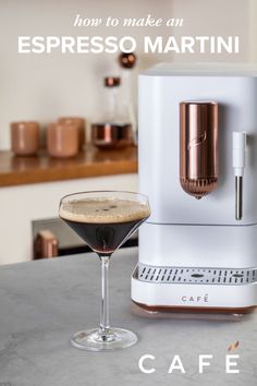 the espresso martini is ready to be served in front of an espresso machine