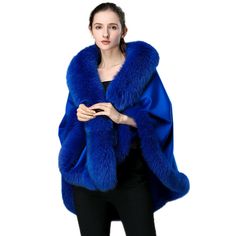 Description Commodity: Women Real Cashmere Cape Poncho True Fox Fur Trim All Cloak Stole Coat For Party Material:10%Cashmere+90%Wool+Real Best Fox Fur Trim; Size:The maximum length:85 cm(From top of the collar to bottom of cape);        The minimum length:80cm( From bottom of the collar to bottom of cape );        Fox Fur Collar Width:16cm;        Bottom Fox Fur Width:10cm Size error 1-3cm Color: See the picture Friendship reminder:  1.The Cape Is made of Real 90% Wool and 10% Cashmere. All Arou Blue Fall Shawl, Elegant Blue Shawl For Fall, Elegant Blue Fall Shawl, Blue Winter Outerwear For Evening, Winter Outerwear With Shawl Collar For Party, Formal Fall Shawl, Cashmere Cape, Cashmere Poncho, Party Dinner