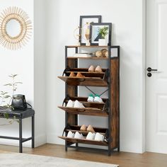 the shoe rack is made out of wood and has four shelves with shoes on it