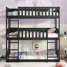 a bunk bed with two sets of ladders on the top and bottom bunk beds