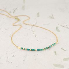 This Delicate Turquoise Beaded Necklace is handcrafted for you with great care. Featuring beautiful Natural Heshi Turquoise Beads the necklace has a delicate and feminine look. It will be a great addition to your jewelry collection and a great gift for your December birthday! MATERIALS AND SIZE ◆ Metal - 14K Gold Filled, 925 Sterling Silver  ◆ NECKLACE LENGTH = the total circumference of the necklace including the clasp, while the pendant size is specified in each listing.      Please check the Turquoise Beaded Chain Necklace Gift, Everyday Minimalist Turquoise Necklace, Handmade Turquoise Beaded Necklaces For Everyday, Green Turquoise Necklace With Tiny Beads For Gift, Green Turquoise Necklace With Tiny Beads As Gift, Turquoise Necklace With Tiny Beads As A Gift, Minimalist Turquoise Beaded Necklace With Tiny Beads, Minimalist Beaded Turquoise Necklace, Everyday Handmade Turquoise Beaded Necklace