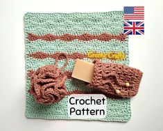 a crochet pattern on a green and brown blanket with a rubber stamp attached to it