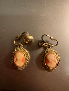 Vintage Cameo dangling clip on earrings circa 1970's.   Perfect for that vintage jewelry collector.  AS IS If you are local to 72675, let me know before you purchase and I will waive shipping and meet to deliver. Antique Bottle, Vintage Cameo, Antique Items, Antique Collection, Clip On, Clip On Earrings, Jewelry Earrings Dangle, Etsy Earrings, Vintage Jewelry