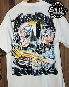 #vintagereprint #tshirt #tee #streetwear #Rollinhard #Mexican #lowriderculture #lowrider #chicano #carculture #lowriderart #chicanoart Band Merch Shirt With Graphic Print For Festivals, White Grunge Tops For Music Festivals, Graphic Tee For Streetwear At Festivals, Band Merch Tops With Custom Artwork, Graphic Tee For Festival Streetwear, Graphic Tee Tops With Custom Artwork For Fans, Grunge Fan Merchandise T-shirt For Festivals, Fitted Graphic Print T-shirt For Festival, Graphic Tee Tops For Streetwear Festival