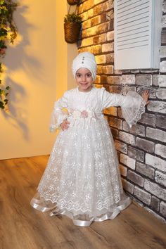 Child Hijab Evening Dress Ayse Model Color: White Fabric Feature: It is made of Sanel Crepe, Multi Chiffon and Tulle fabric. It can be used in 4 seasons. Product Features: It is produced with Şanel crepe, multi chiffon and tulle fabric. It has a hidden zipper on the back. Our product is festoon tulle detailed. The back is belted, if it is wide, it can be tied at the back and adjusted. Note: This product is White in color. If you are looking for a different color, visit our Etys store. https://ww White Dress For Eid Ceremony, White Dresses For Eid Ceremony, Dress For Hijab, Dubai Hijab, Girls Kaftan, Muslim Gown, Kids Abaya, Eid Dress, Hijab Wedding