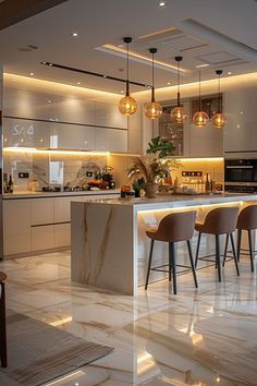 a modern kitchen with marble flooring and bar stools