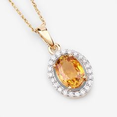 14K Gold Yellow Sapphire Pendant, Genuine Yellow Sapphire and Diamond Pendant Necklace, September Birthstone, Bridal Sapphire Pendant Bright, beautiful colors make this halo pendant into a one-of-a-kind statement piece you'll love. Our 1.78 ct. t.w. oval genuine yellow sapphire pendant necklace is set in polished fine finish 14k yellow gold for a divine look at a smart price. Yellow sapphire is a stunning gemstone that has a deep and rich yellow color. It is also very durable and resistant to sc Exquisite Orange Gemstone Jewelry, Citrine Gemstone Oval Pendant Jewelry, Orange Gemstone Pendant Jewelry, Yellow Gold Stone Pendant Jewelry, Yellow Gold Pendant Jewelry With Stones, Yellow Gold Multi-stone Oval Pendant Jewelry, Dazzling Gemstone Round Pendant Necklace, Orange Diamond Gemstone Jewelry, Diamond Oval Pendant Necklace With Gemstone Accents