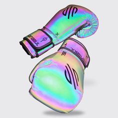 pair of holographic boxing gloves on grey background with clipping out for text