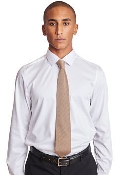 The Stanley Knit Tie in tan adds a pop to any outfit. With a high-quality knit material, you'll have this for years to come. It's the right addition to any brunch or formal party attire, whether you're going casual or fancy.PRODUCT DETAILS: style 6580T slim-tie 100% polyester imported Fall Suit, Party Attire, Slim Tie, Formal Pants, Knit Tie, Formal Party, Fall Shopping, Knitting Materials, Casual Jacket