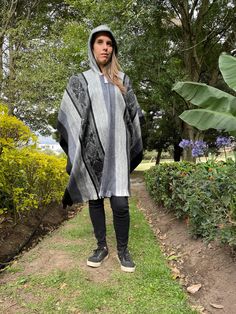 Our beautiful alpaca ponchos are perfect for a casual chilly day or can be dressed up for an evening out. The ponchos are a pullover style with a hood and you will love the coziness of the alpaca wool. The ponchos have grey tones with a tribal design. 70% alpaca 30% acrylic Dimensions:  Length: 36 in  Width: 42 1/2 in  Benefits Of Fancy Alpaca Ponchos ♥ The durability of the alpaca wool means your Fancy Alpaca poncho will remain a cherished item of your wardrobe for many years to come.  ♥ Easy t Casual Alpaca Poncho For Winter, Fashion Poncho, Alpaca Poncho, Boho Poncho, Artisan Fashion, Wool Poncho, Christmas Clothing, Wool Clothing, Poncho Style