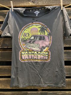 Country Deep Vantastic 1980's vintage distressed 1980's unisex T shirt available in faded black 40 Singles Jersey 100% Cotton Premium quality ringspun and compacted cotton Fine Cotton Jersey that is pigment dyed for a more vintage look Features tears and destroyed features at neck and on body Each piece is unique as this process is done by hand! 3.8 oz Made In USA Every garment dye item can be a slightly different shade in color since this is a laundry dye process. Enjoy its unique quality! SIZE 1980s Vintage, Black Media, Black And Navy, Vintage Black, Vintage Looks, Size Chart, Shirt Designs, Mens Graphic Tshirt, Mens Tshirts