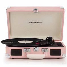 a pink suitcase with a record player in it