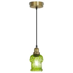 a green glass light hanging from a ceiling fixture