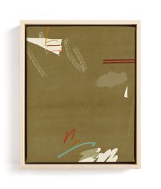 an abstract painting with various colors and shapes in a wooden frame on a white wall