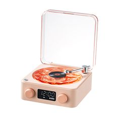 an old fashioned record player with a pizza in it's case on a white background