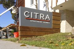 the sign for citra apartment homes in front of a building