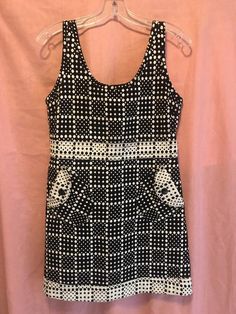 Sz 6 Marc jacobScoop neck line Black & white polka dot  dress over all style Side slated pocket - large black buttonsZipper back - hook & eye closure Side loop & button detailLined Above knee Summer Polka Dot Dress With Pockets, Casual Polka Dot Dress With Pockets, Cotton Mini Dress With Side Pockets, White Fitted Dresses With Side Pockets, Fitted White Dresses With Side Pockets, Fitted Spring Dresses With Patch Pockets, Chic Polka Dot Cotton Dress, Chic Cotton Polka Dot Dress, Black Cotton Dress With Side Pockets