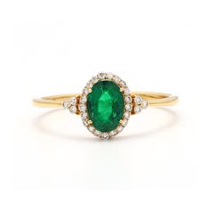 14k Yellow Gold Ring * Emerald May Birthstone Ring * Oval Cut Gemstone Ring * Large Sizes Gold Ring * Bridal Ring S T O N E ∙ D E T A I L S *Gemstone: Emerald *Gemstone Type: Natural *Gemstone Shape: Oval *Number of Gemstones: 1 *Gemstone Weight: 0.54 Cts *Gemstone Grade: AAA *Diamond Shape: Round *Number of Diamond: 27 *Diamond Weight: 0.15 Cts *Diamond Grade: G Si (Eye Clean) M E T A L ∙ D E T A I L S  *Metal Color: Rose Gold, Yellow Gold, White Gold *Metal: 10k, 14k, 18k *Ring Size measure: S Oval Yellow Gold Emerald Ring With Halo, Oval Yellow Gold Cluster Ring With Accent Stones, Oval Halo Emerald Ring For May Birthstone, Oval Halo Ring With May Birthstone, Halo Oval Diamond Ring For May Birthstone, Oval Diamond Ring With Halo For May Birthstone, 14k Gold Oval Halo Ring, Oval Emerald Ring In Yellow Gold With Halo Setting, 14k Gold Halo Ring With Oval Shape