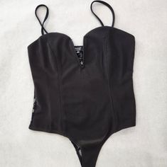 New-Privy Black Bodysuit Color: Black Size: M #Sexystyle #Blackbodysuit #Bodysuitbabe #Dresstoimpress #Boldandbeautiful #Partywear Black Bodysuit With Built-in Bra For Club, Shapewear Bodysuit With Lined Body For Night Out, Black Low-cut Bodysuit, Fitted Low-cut Bodysuit For Night Out, Black High Cut Lined Bodysuit, Black High-cut Lined Bodysuit, Low-cut Bodysuit With Built-in Bra For Night Out, High Cut Club Bodysuit With Lined Body, Club High Cut Lined Bodysuit