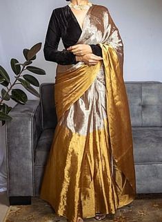 Wrap yourself in elegance with our off-white handloom Chanderi silk saree - because why settle for ordinary when you can sparkle like a star? ✨ This beauty features gold antique zari and a chic stripe pattern, making it your ticket to instant glam. Imagine strutting around like a secret celebrity - because, this saree is your red carpet moment waiting to happen! 🌟 Don't just wear a saree; own the spotlight with Poonam Sarees! 💫🛍️ #SareeStar #GlamInSilk Fabric: Pure Silk Colour: Same as pictur Glamour Party, Tissue Silk Saree, Bridesmaid Saree, Chanderi Silk Saree, Saree Blouse Designs Latest, Gold Blouse, Plain Fabric, Contrast Blouse, Blouse Designs Latest