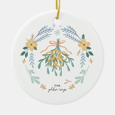 a ceramic ornament with an image of flowers and the words five golden ways on it